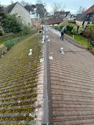 Tiled roof being worked on